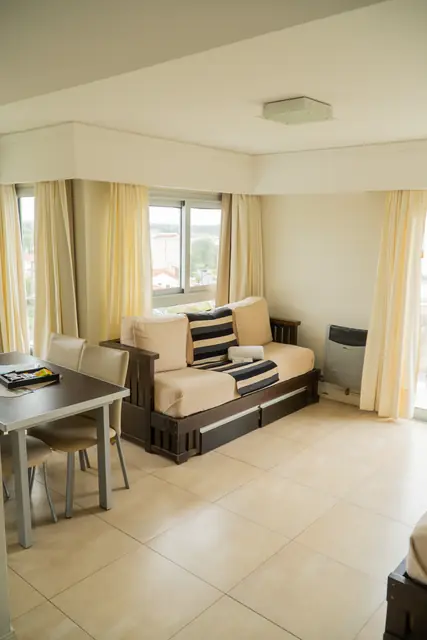Living comedor en Apart Hotel Sotavento Miramar
